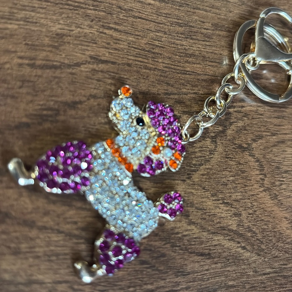 Sparkling poodle dog Keychain with purple orange Accents